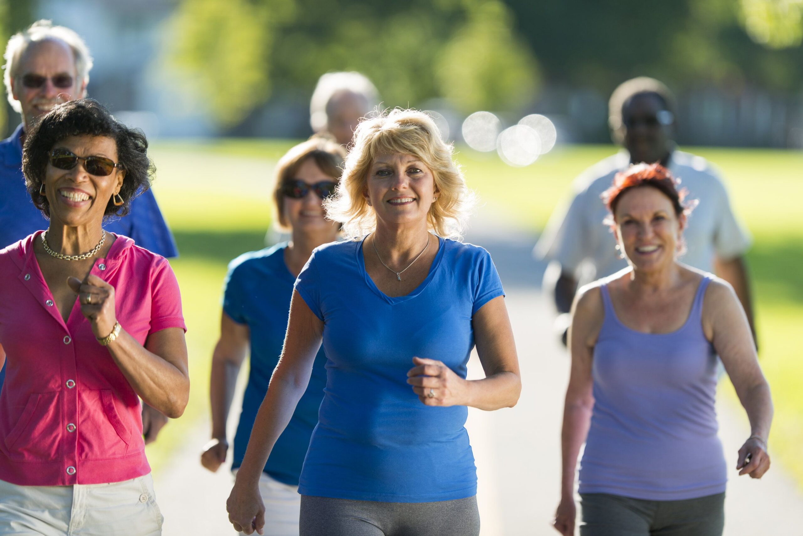 Older people walking in the park together